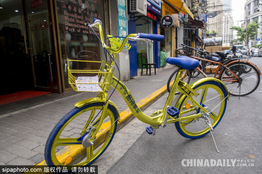 上海：共享單車(chē)顏色沒(méi)用完 酷騎土豪金配色“亮瞎眼”